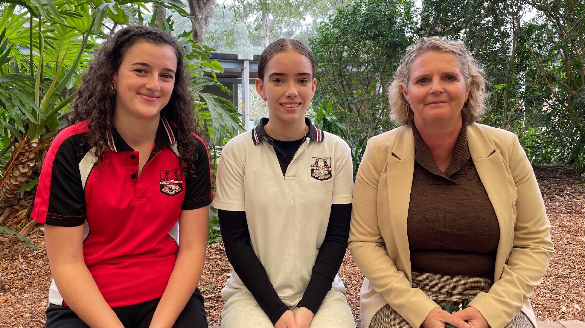 Year 12 students Sienna ONeill and Skye Carter, with Batemans Bay High School principal, Paula Brennan. Picture by Vic Silk.