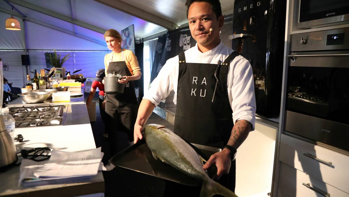 Chef Ben from Raku with whole kingfish. Picture by Vic Silk.