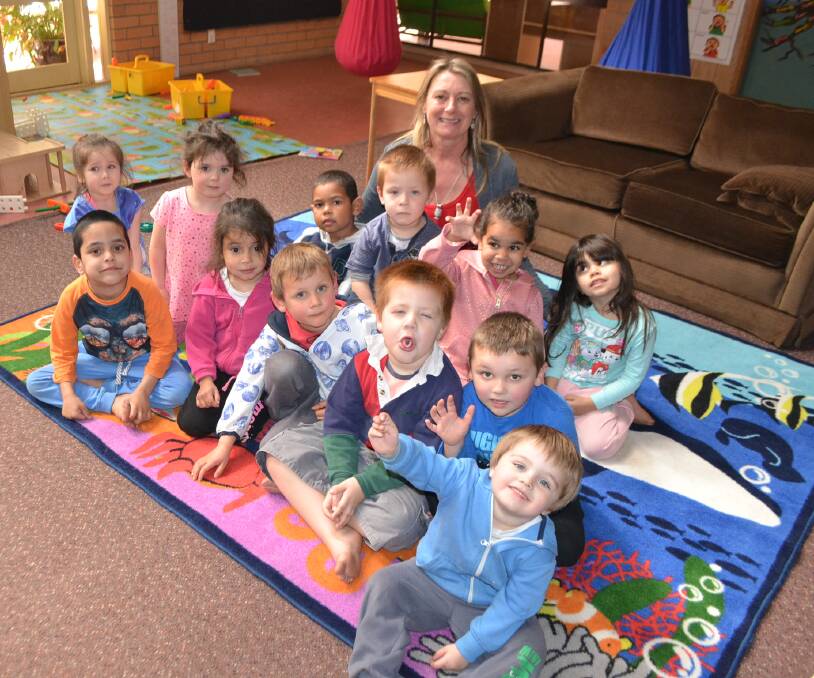 RETIRING: Little Yuin preschool director Lea Sutherland and a class of youngsters, who will be sad to see her retire in December. A reader will also miss her.