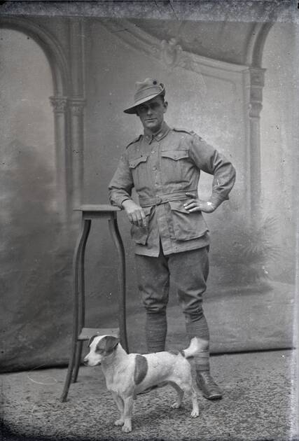 Austalian Rupert Sydney Boothey, 43rd Battalion, with Jack Russell terrier.