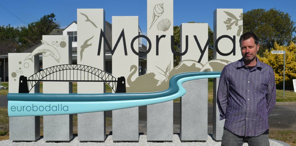 NOT HAPPY: Moruya resident Toby Whitelaw thinks the design of the town signs is a "disaster". 