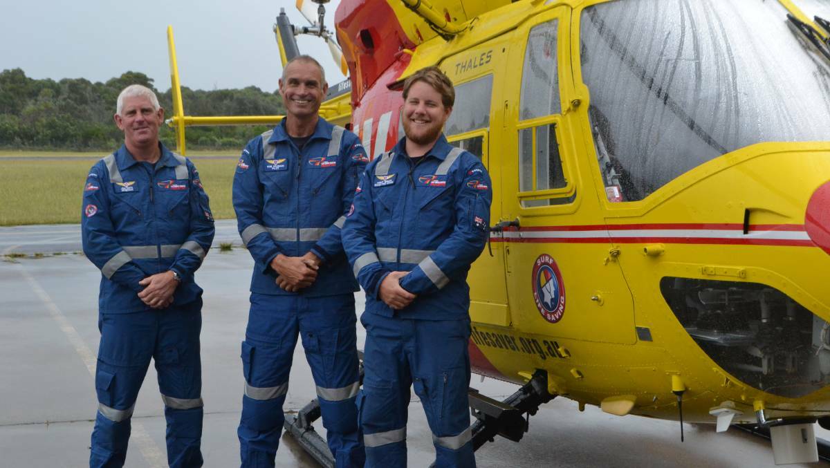 READY, SET, GO: Moruya’s Westpac Life Saver Rescue Helicopter air crewman John Costin, pilot Rob Wildman and rescue crewman Harley Dengate. Photo: Emily Barton. 