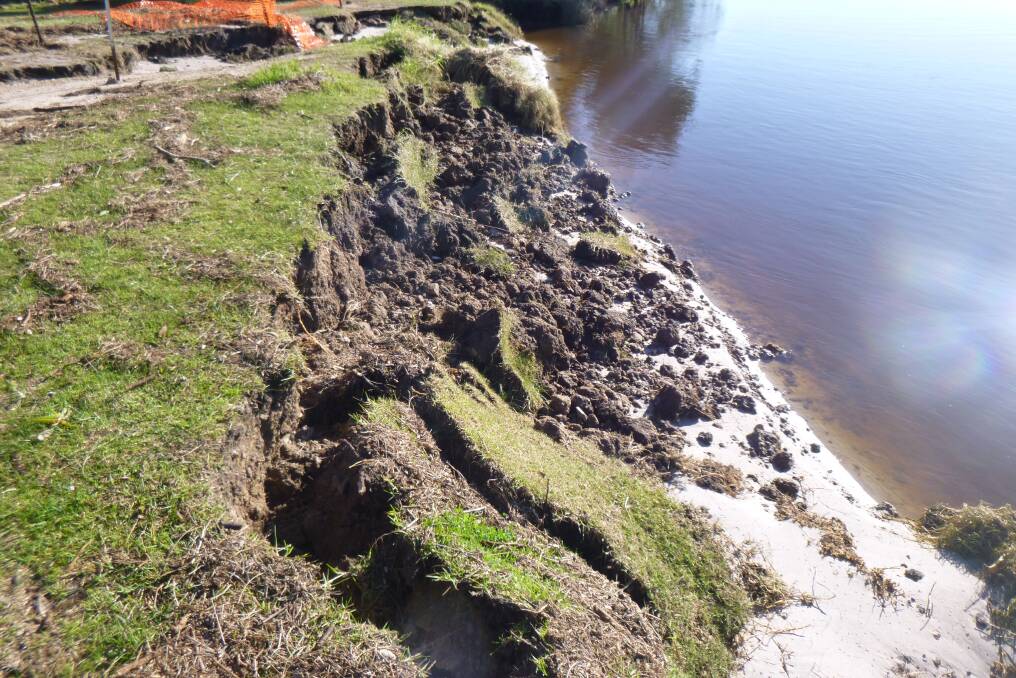 WORK: Eurobodalla Shire Council is constructing a rock wall on Mummaga Lake to minimise bank erosion.