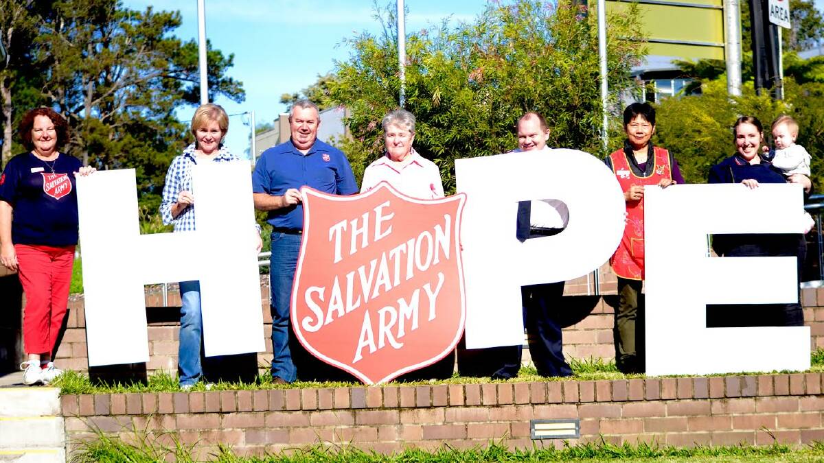 BRINGING HOPE: Janelle Wright, Carys Morgan, Craig Macklan, Evelyn Ford, Ben Knight, Marti Vann and Rachel and Mia Knight at the Salvation Army Batemans Bay office.