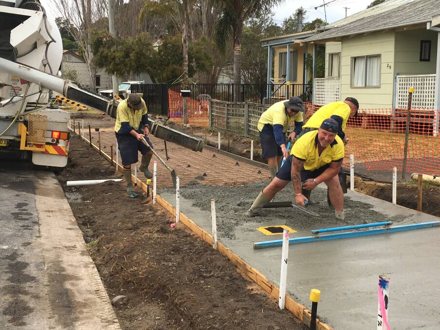 KNEE DEEP: Council is building a shared pathway along the southern side of McMillan Parade in Narooma, providing a safe, off-road link from the shops to the foreshore. Rob Josifovski finds time for a smile.