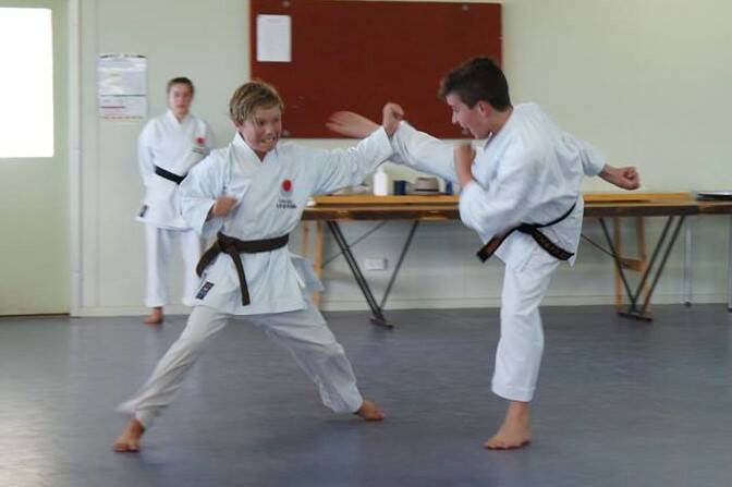 Photos of Jack doing karate
