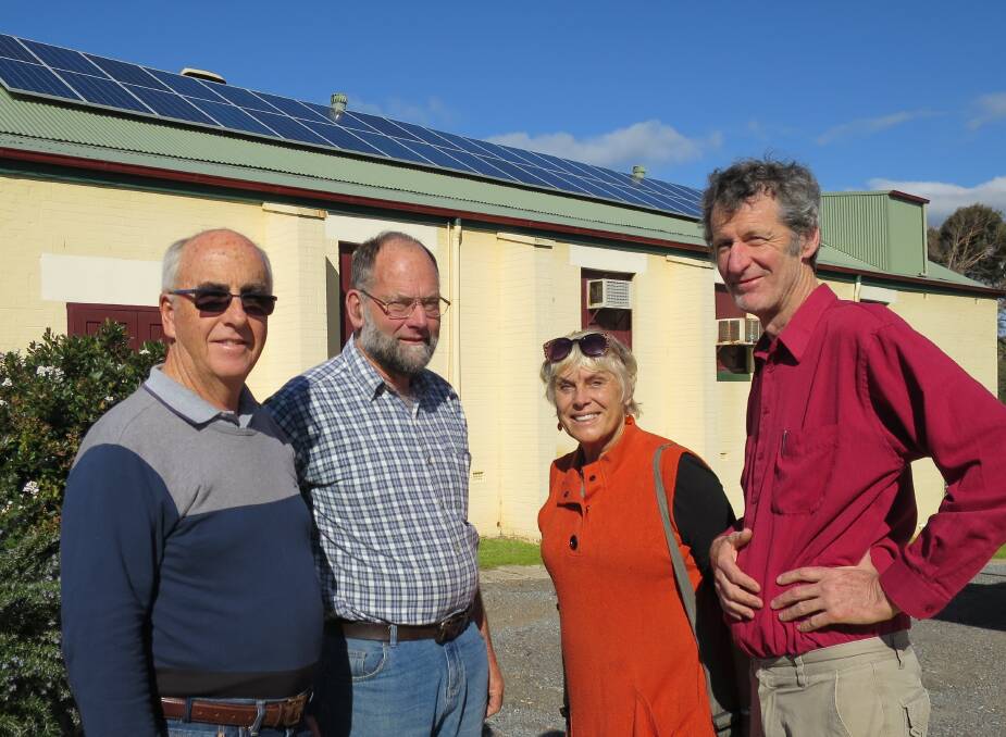 Narooma Rotary’s Renewables Expo (26-27 November) organising committee members Mike Young, John Doyle, Angie Ulrichsen and Frank Eden in front of the School of Arts Hall (Kinema) and its solar panels, installed recently with the assistance of a donation from Narooma Rotary. 