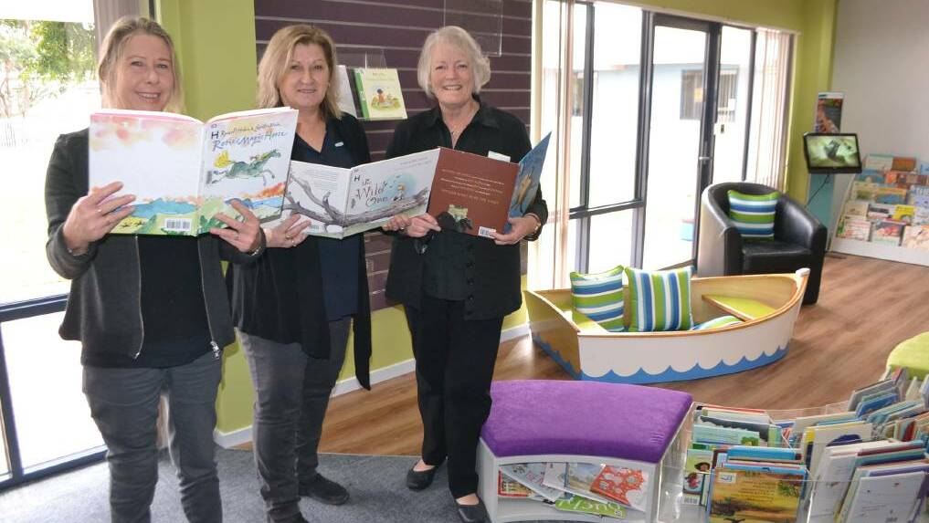 Library officer and team leader Di Lihou with her team Deb Colburn and Jennifer Willcocks at the new children's area at Narooma Library.  