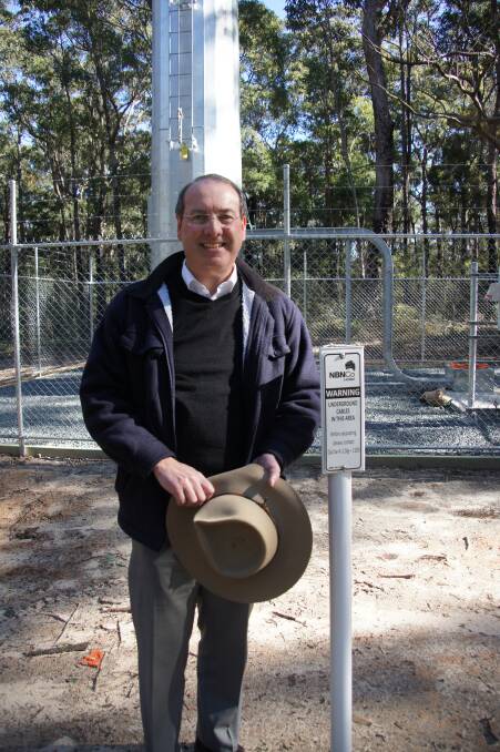NBN TOWER: Federal Member Peter Hendy at the fixed wireless NBN tower at Bermagui that will relay broadband via other towers into southern Eurobodalla. 