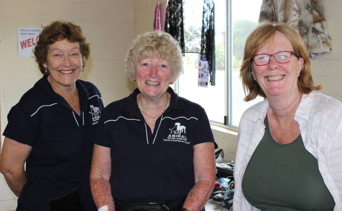 VOLUNTEERS: Meryl Henry, Rhonda Morris and Bonnie Hibbett are part of the team of wonderful volunteers helping out at the AWL Eurobodalla garage sale.