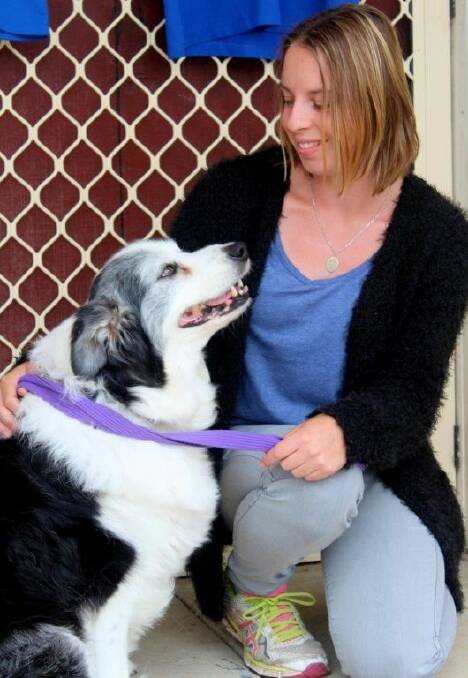 Caitlin Blay with Yve Robinson’s dog, Tillie. Photo by Rosy Williams