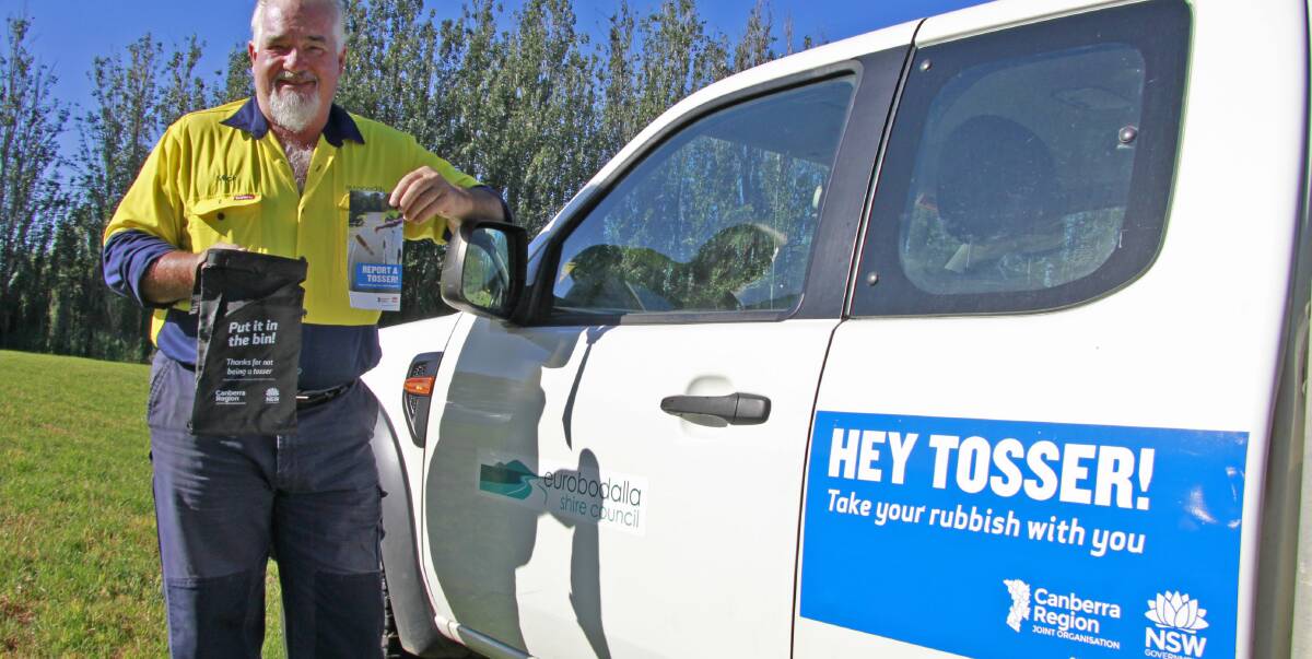Eurobodalla Shire Council invasive species officer Mick Johnson with the free litter bags available at service stations, visitor information centres and other visitor hotspots as part of the Hey Tosser campaign.  
