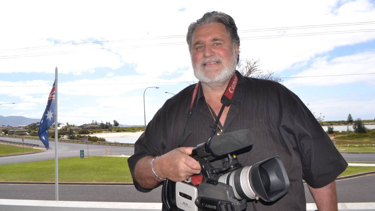 FILM AWARD: Filmmaker John Murray with one his cameras on the deck of his Bermagui house. 