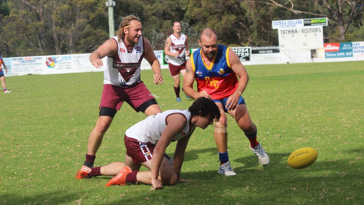 Photos by Hollie-Kae Betts of the Narooma AFL Lions in action 