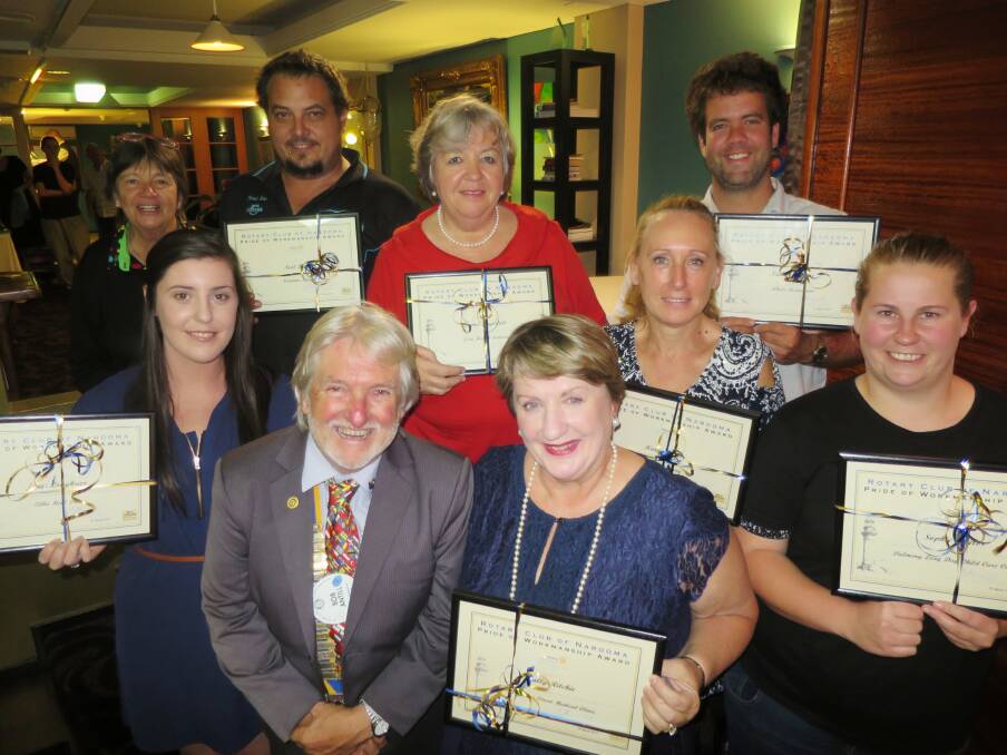Narooma Rotary President Bob Antill, front left,  presented Pride of Workmanship Awards last Thursday to Sally Ritchie of Wagonga Street Medical Clinic, Sophie Taylor of Dalmeny Long Day Care;  Jenni Laughran of Tilba Real Milk, back left, Noel Bate of Narooma Motors, Leanne Drysdale of Estia Health, Karen Tasker of IRT Dalmeny, and Nathan Adams of the Whale Restaurant. Narooma Rotary Vocational Director Laurelle Pacey is top left.        