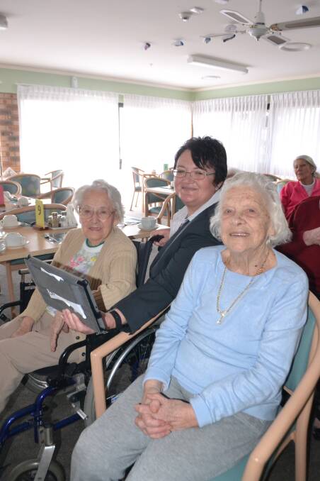 HIGH-TECH SENIORS: IRT Dalmeny lifestyle services manager Leanne O’Neill with residents Dorothy Manning and Corrie Vandespyker at the launch of “The Good Life” YouTube channel.  