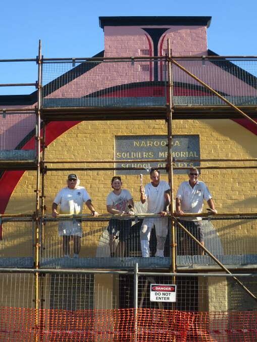 Working on the exciting new exterior colour design on Narooma School of Arts Hall (Kinema) are Mick Pepper of Waratah Signs, left, and South Coast Decorators Hahn Gunthorpe, Tony and Scott Barker. 