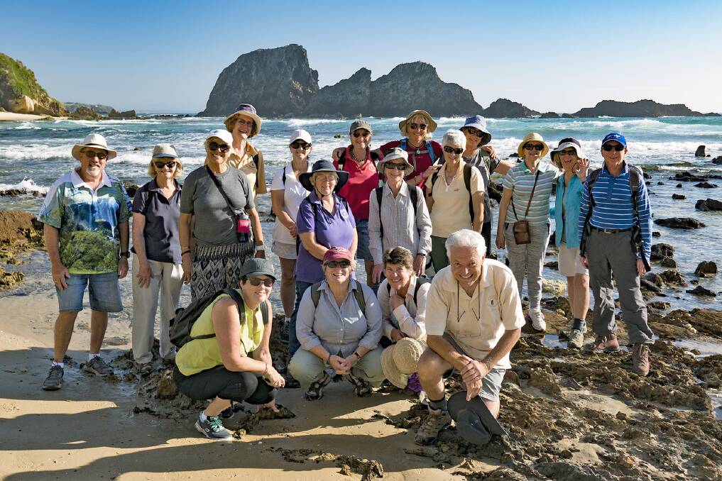 Beautiful setting: Dalmeny Narooma Bushwalkers pause at Glasshouse Golden Rocks during their 5km walk last week.