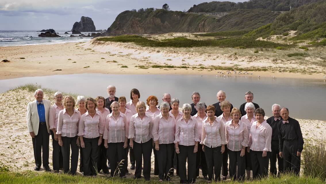 NAROOMA SINGERS: The Montague Choristers choir pictured at Narooma surf beach back in 2010. The Choristers celebrate 30 years of singing this month. 