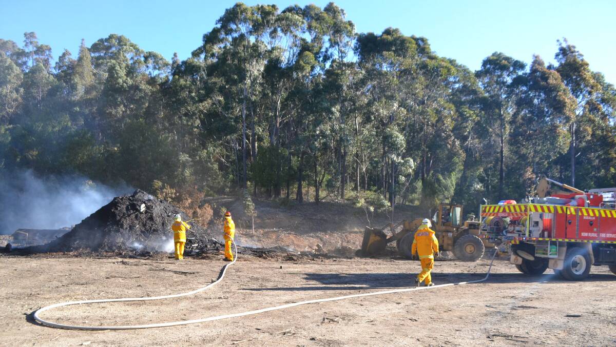 Photos the RFS working on the sawmill fire
