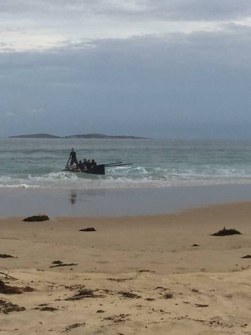 Narooma veterans training for the event in their newly acquired black stealth boat. 