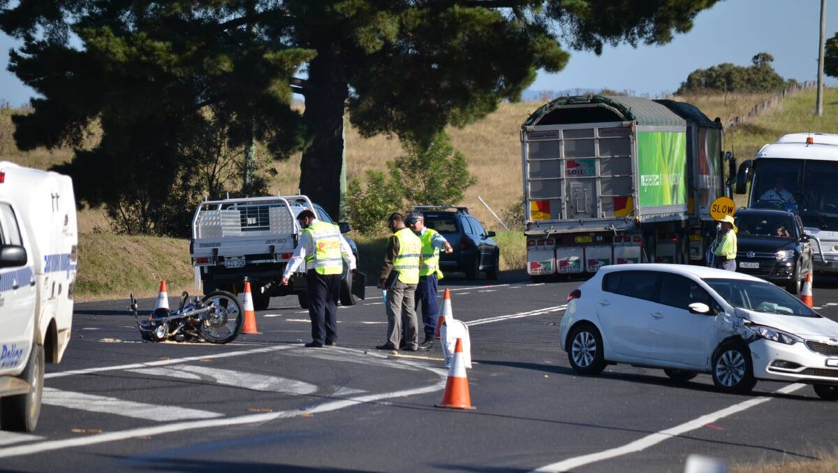 Batemans Bay detectives and Queanbeyan forensic police investigate the cause of a serious road accident at Tuross Head on April 27. 