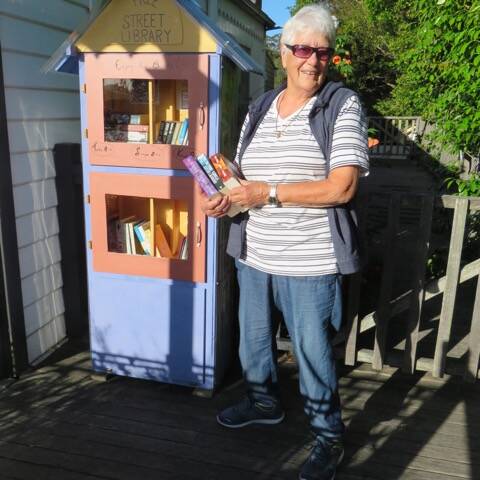 LIBRARY BUILDER: The driving force behind the library is Bodalla resident Vera Moxey, who built the tiny library from a cupboard she found at the shop at the Brou landfill.