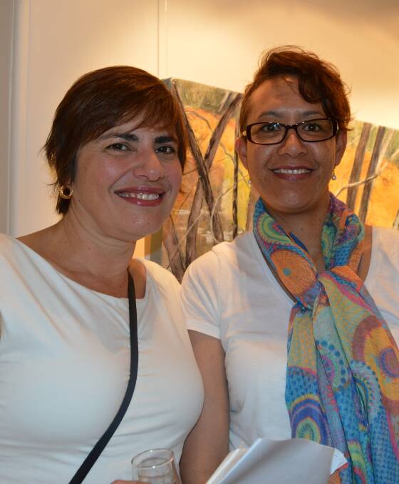 Sandra Makdessi of Moruya with Celeste Shirley from Brisbane at Gallery Bodalla's exhibition opening on Saturday.
