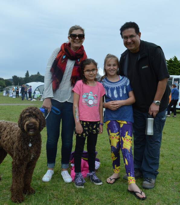 The Sacoor family of Narooma, Michele and Anelie with friend Lana Wheat and Daniel Sacoor along with Vince the friendly Labradoodle at Sunday's AWL Tailwagger's Walk in Narooma.