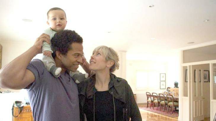 A cherubic, thriving boy: Andre and Kristine Scott with Leroy. Photo: Supplied
