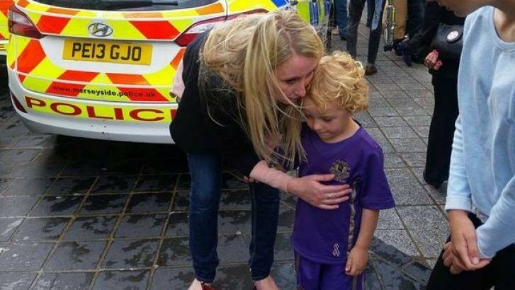 Reunited: Emma and Leon back together after the three-year-old became lost in the crowd.  Photo: Facebook: Del Rooney
