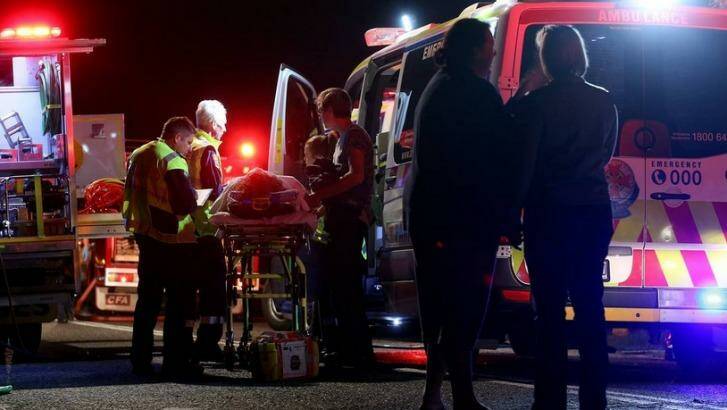 Emergency services at the crash site at Staghorn Flat on Saturday night. Photo: The Border Mail