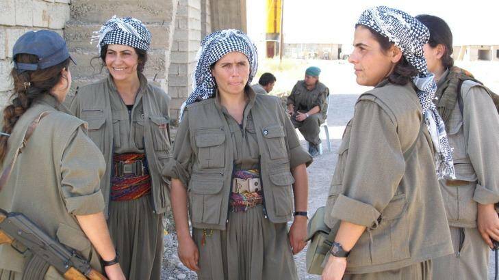 Commander Nuve Rojhat (centre) with some of the fighters in her unit at the Daquq PKK base. Photo: Ruth Pollard