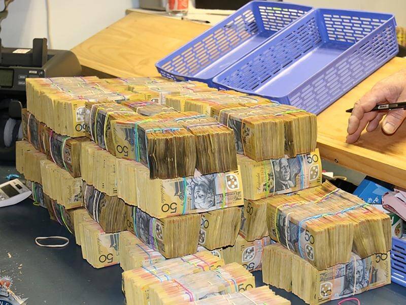 Drug dealers, people smugglers and other criminals use money laundering to legitimise their crimes. (HANDOUT/AUSTRALIAN FEDERAL POLICE)