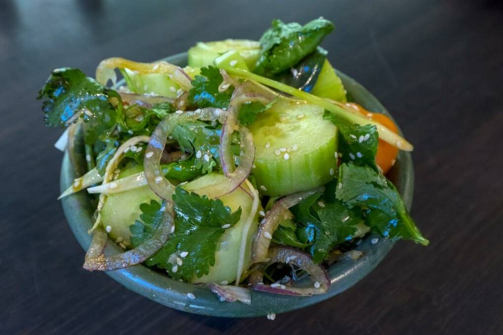 Smart street food: Cucumber tomato and sesame salad plated up at Gingerboy.
