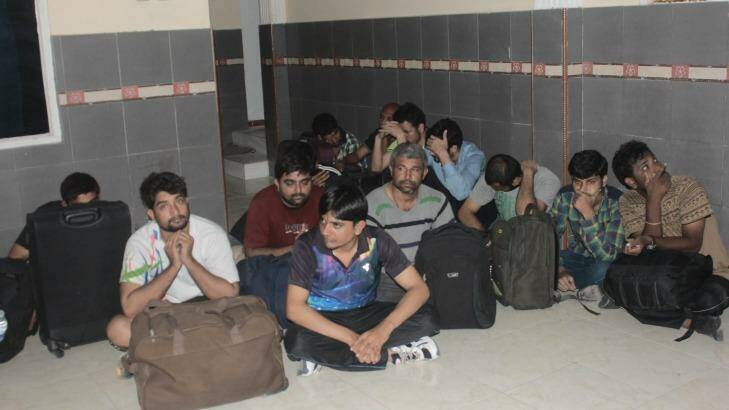 The male asylum seekers, who are from India, Nepal and Bangladesh, at Nusa Tenggara Timur police station. Photo: Supplied