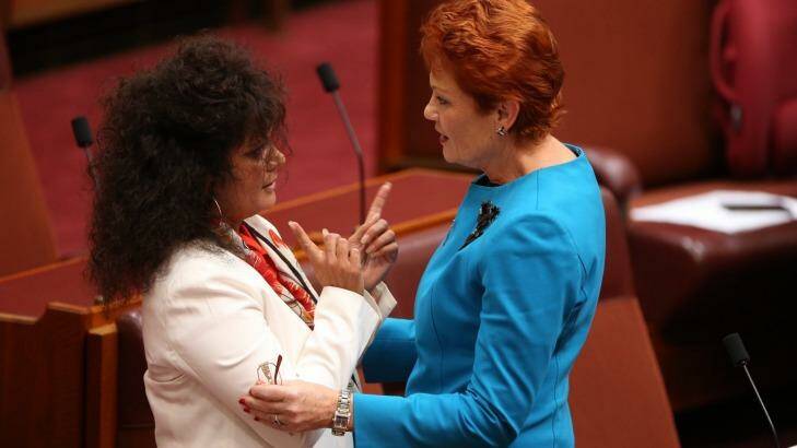 Labor senator Malarndirri McCarthy with senator Pauline Hanson after the One Nation leader's first speech in the Senate. Photo: Andrew Meares