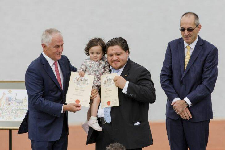 News. 26th January 2016. Australia Day  Citizenship Ceremony at Canberra. 
Prime Minister Malcolm Turnbull announcing citizenships to Diego Torre and his daughter Johanna.

The Canberra Times

Photo Jamila Toderas