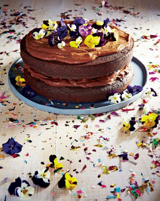 Lola Berry's paleo chocolate birthday cake <a href="http://www.goodfood.com.au/good-food/cook/lola-berrys-paleo-chocolate-ganache-birthday-cake-recipe-20150209-135pxo.html"><b>(Recipe here).</b></a> Photo: Supplied