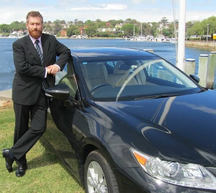 Russell Howarth with his hire car after he carried out his first citizen's arrest. Photo: Supplied