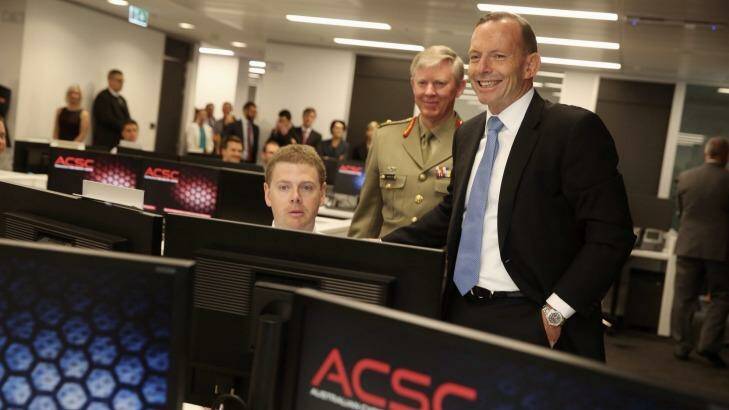 Mr Abbott on a tour of the new centre. Photo: Andrew Meares