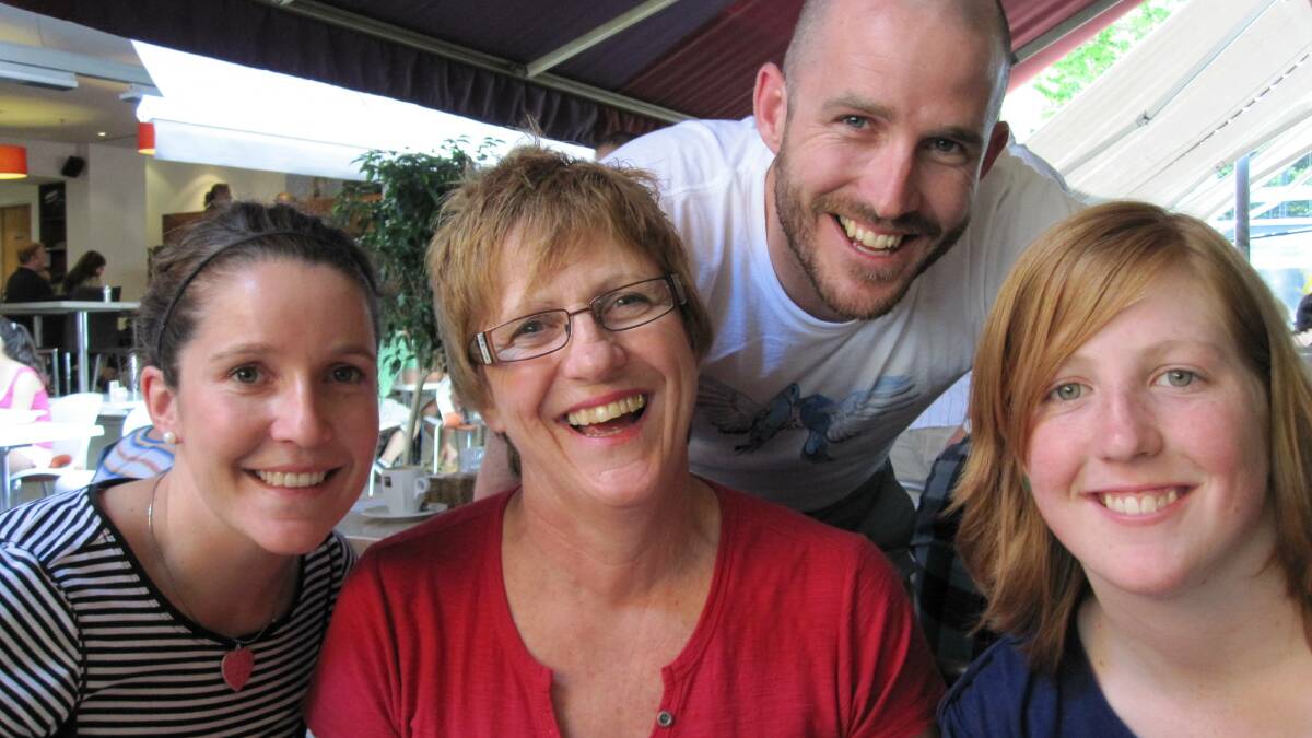 Farewelled: Sally Thistlewaite (centre) was remembered for her
vivacious personality at her funeral in Canberra on August 4. She is survived by her children, Crystal Dunn, Aaron Dunn and Chelsea Thistlewaite.