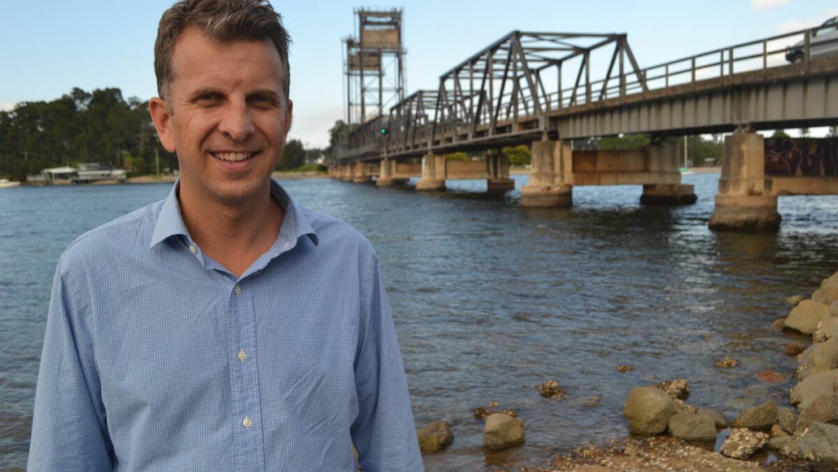 DOUBLING UP: Bega MP and NSW Treasurer Andrew Constance next to the Batemans Bay Bridge.