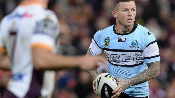 Sacked again: Todd Carney has been shown the door by the Cronulla Sharks after a disturbing photo went viral over the weekend. Photo: Getty Images.