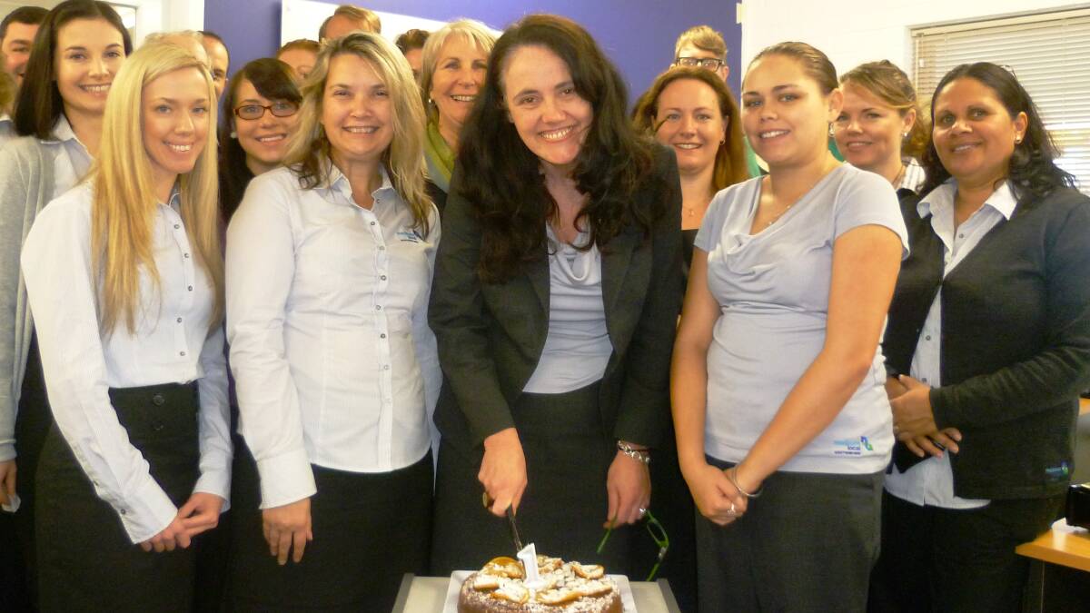 Southern NSW Medicare Local CEO Kathryn Stonestreet (centre) and staff celebrate the first anniversary of the organisation in July 2013. It’s now being merged with Illawarra Shoalhaven Medicare Local to form the South Eastern NSW Primary Health Network. 