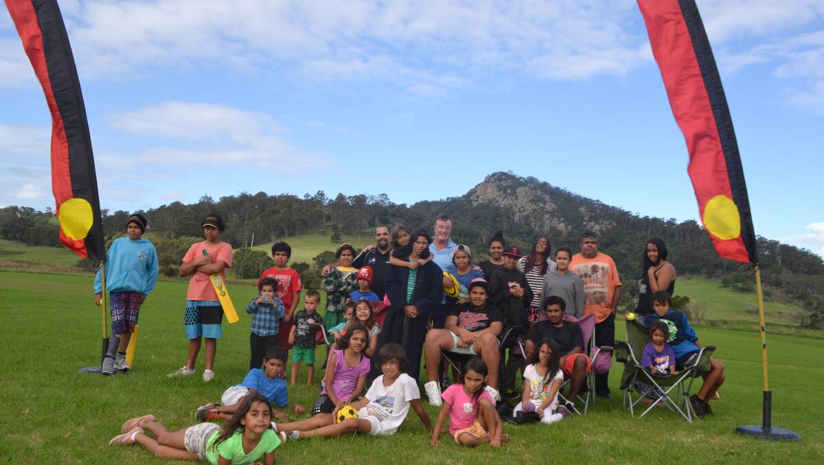 KOORI PRIDE: The kids gather for the Wallaga Lake Koori Village sports days at the Tilba Oval on Sunday supervised by PCYC officer Greg Curry and Aaron Williams from Campbell Page’s Youth Connections program. 