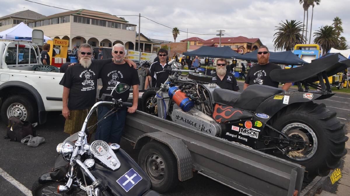 MONGREL RACING: Team Mongrel Racing deliver the V8 dirt drag bike. Pictured are Sharky, Peter Hellyer, Gary Bains, Steve Henness and rider Stork. 