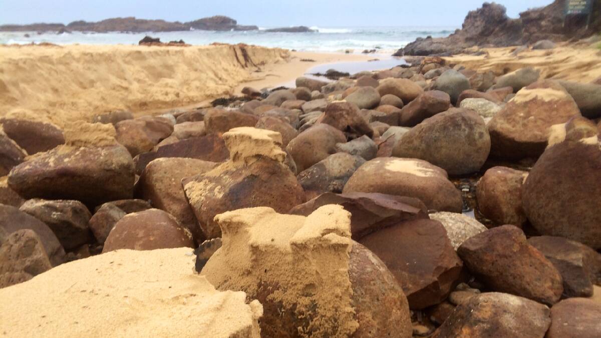 MYSTERY ROCKS: Boulders exposed at Mystery Bay beach after three days of solid rain at Narooma. Photo Stan Gorton