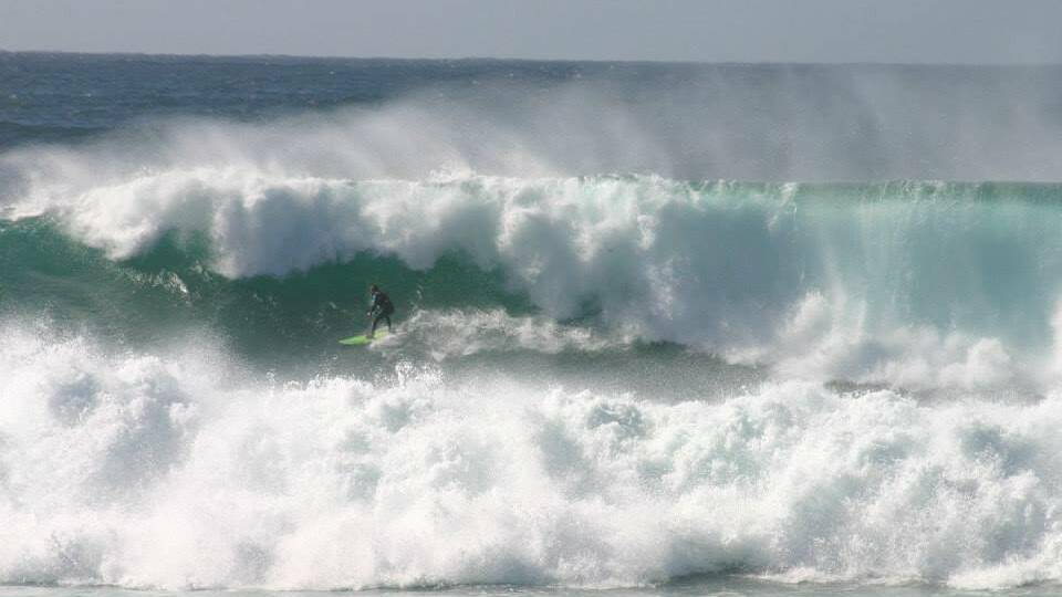 TOW-IN SURFING: Lin Wilton snapped some great shots of Narooma locals Tony and Bradley Lawson tow-in surfing the Narooma bar on Sunday.