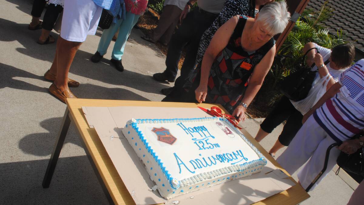 CAKE: The Narooma Public School 125th Anniversary Cake baked by Barry Mead at the ABC Bakery with Sylvia Gauslaa.